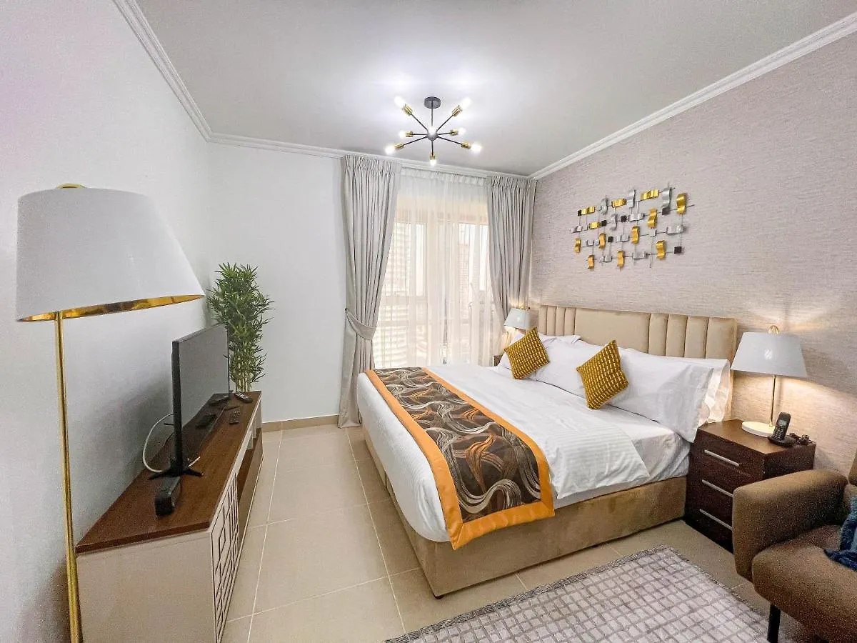 アパート Cosmos Living Luxurious Studio Near Metro ドバイ